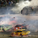 Austin Dillon hits the catch fence at the Coke Zero 400 at Daytona International Speedway in July 2015. Photo credit: Patrick Smith/Getty Images
